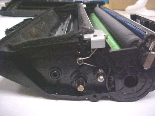 3 4. Use needle nose pliers to remove the contact spring.