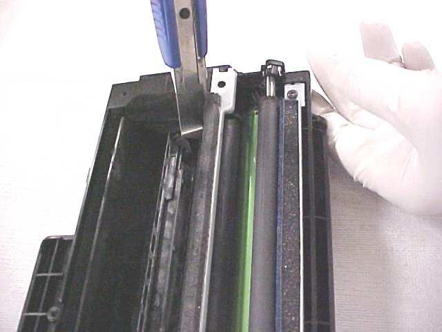 19. Fill hopper with 75 grams of toner and reassemble cartridge in reverse order. Oasis Tech Tips Doctor Blade Removal 20.