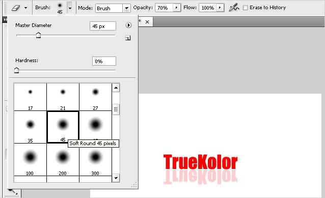 Choose the Eraser Tool (E), set your brush to Soft Round and its opacity to