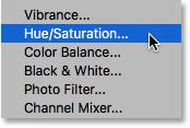 Then choose Hue/Saturation from the menu that appears: Selecting a Hue/Saturation adjustment layer.