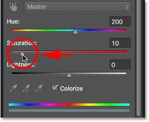 Saturation slider to the left to lower its intensity until the color looks more natural.