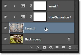 lowering its opacity. First, click on the texture layer (Layer 1) to select it: Selecting the texture layer.