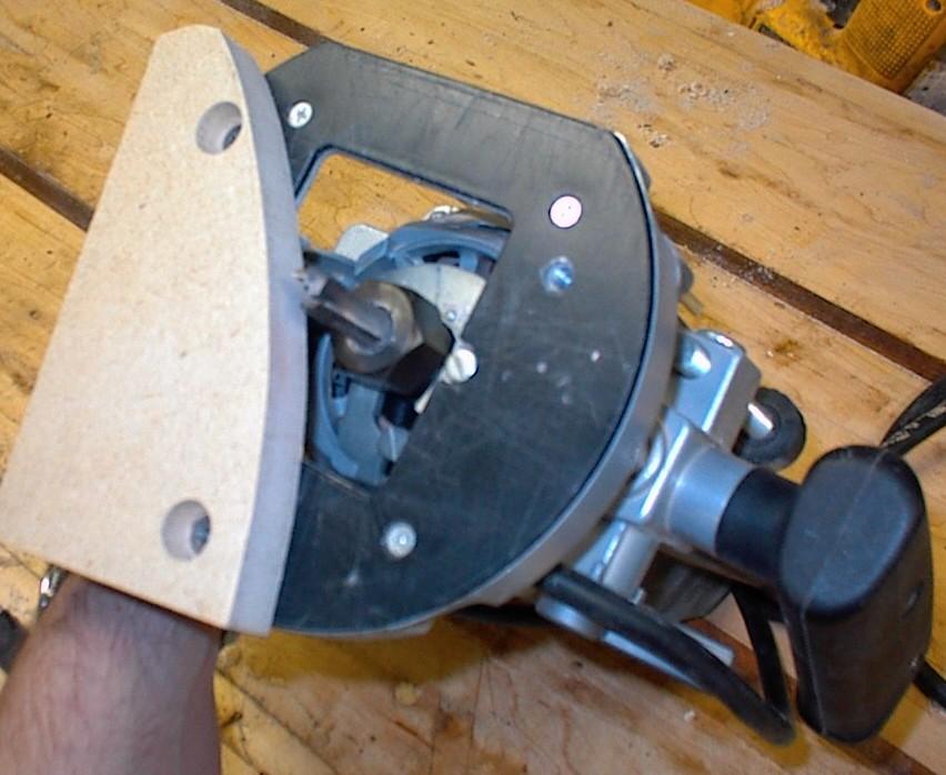 For the base, I use a band saw to cut the shell so it stands ¼ inch proud of the base. I lash the shell to my workbench through the bench dog holes.