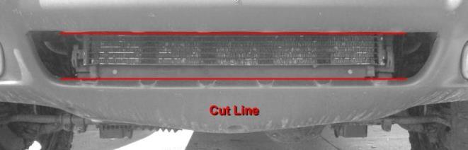 Using a utility knife, die grinder cutoff wheel, or Dremel-type rotary tool, remove the six vertical sections of the lower radiator opening in the bumper fascia as shown in Figure 5.