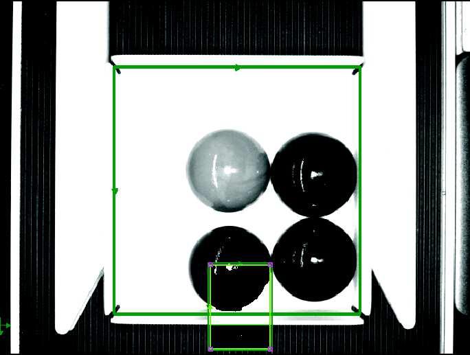Tuning the Machine Vision System 16. Place a box filled with 3 black marbles and 1 blue marble right under the camera and press the Trigger ( ) button.