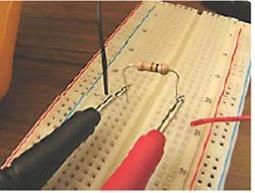 Resistance measurements are made by connecting the DMM probes across the resistor when no voltage is applied to the resistor - the ANDY board power must be off.