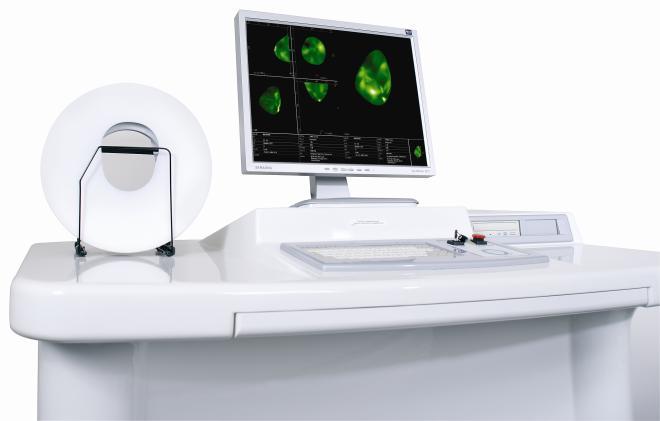 The Scanning Bed includes 4 Centering Rings, which are selected for use according to the patient s breast size. The enclosure of the Scanning Bed is of fiberglass material supported by a metal frame.