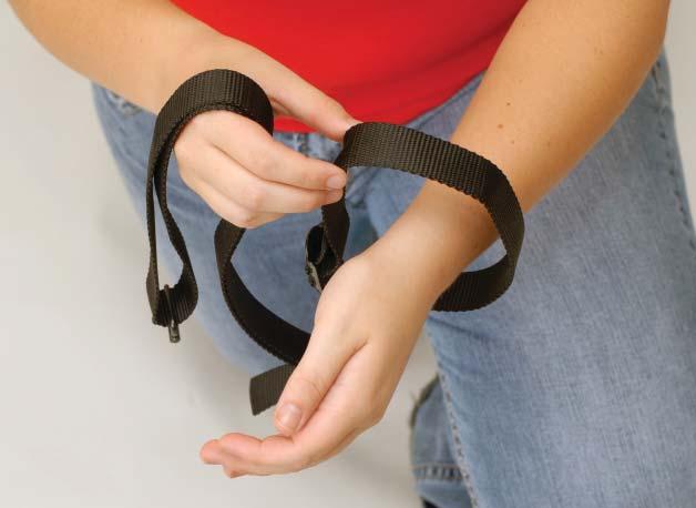 Hold sling with loop in right hand