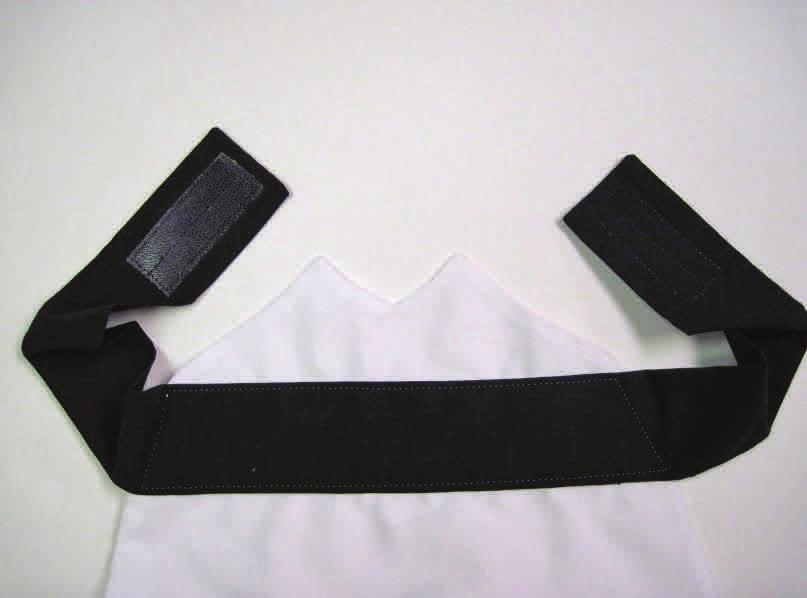Trim the seam allowances to ¼ʺ and clip the excess fabric from the corners. Turn and press.