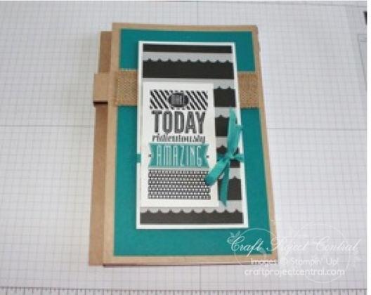 Use Stampin Dimensionals to adhere the Island Indigo piece onto the black stamped piece.