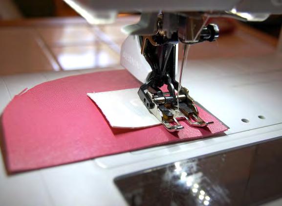 Sew a basting stitch (or very long straight stitch) along each opening about ¼ʺ from the folded edge. Set the lining aside.