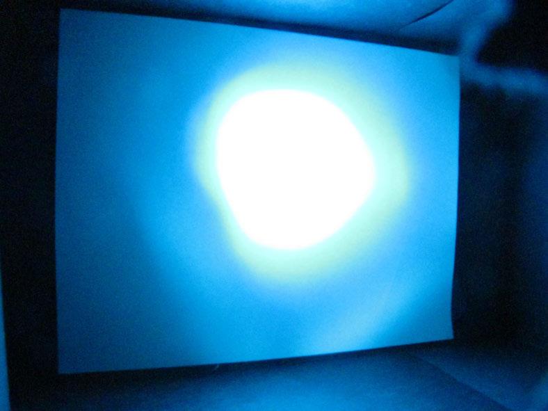 Figure 2: Upper left: this is a picture of a bright light source. This picture makes the white screen on the back of the wall appear clearly. Upper right: a picture on a cloudy day.