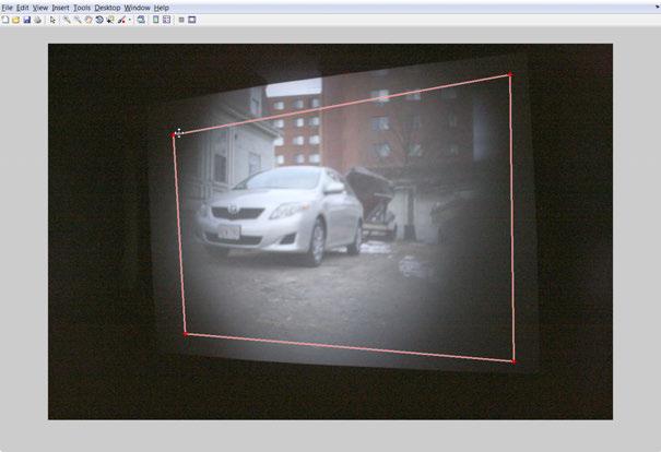 (a) Captured image (b) Image correction tool (c) Rectified image Figure 3: Correcting projective