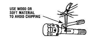 TROUBLESHOOTING GUIDE 1. Problem: Small wire strands or pieces of cable or debris get jammed between the cutter head and blade, not allowing the blade to retract.
