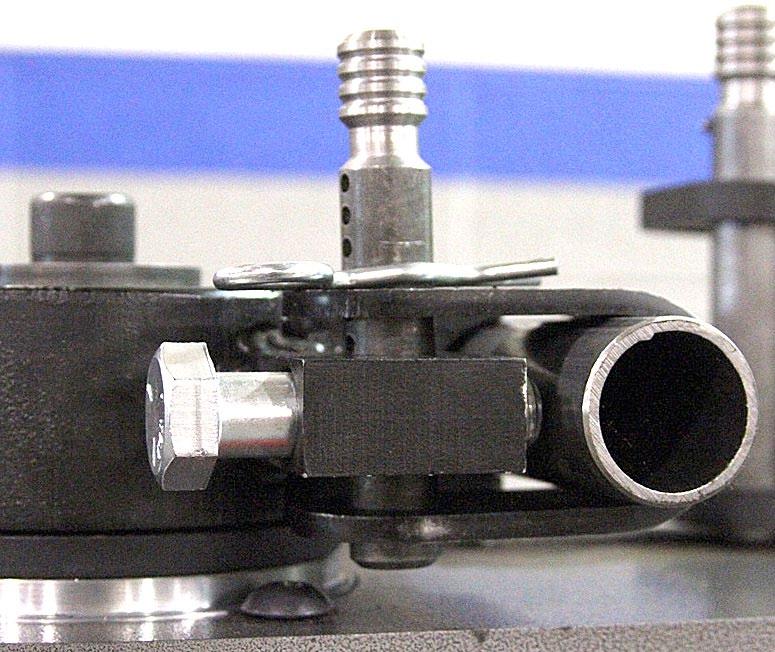 striking the spindle bearing bolts while rotating. This is shown in the picture to the lower right. 3) If bending thin wall tubing (.