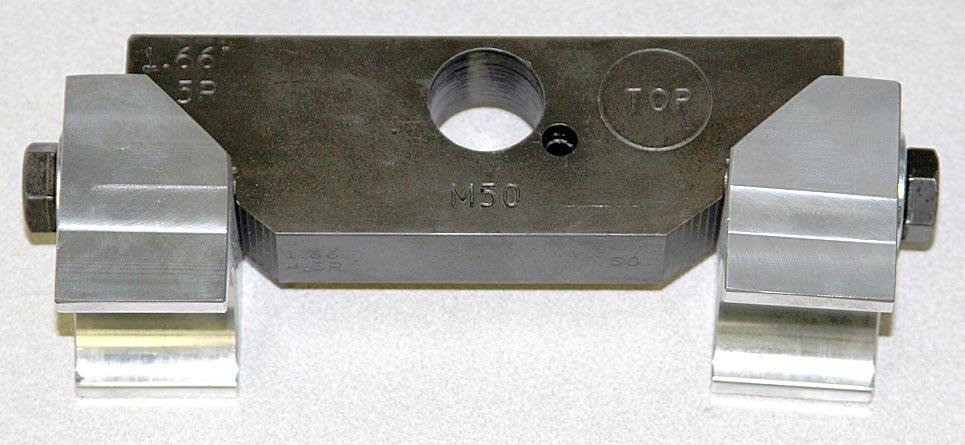 The angled insert is the trailing insert and will always be closest to the u-strap on the forming die.