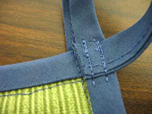 Stitch the loop securely in place and trim off any excess