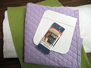 **Medium weight cutaway stabilizer **Temporary spray adhesive **Potholder template (click here to download the PDF) The embroidered area is 4 1/2 inches wide by 3 1/2 inches tall.