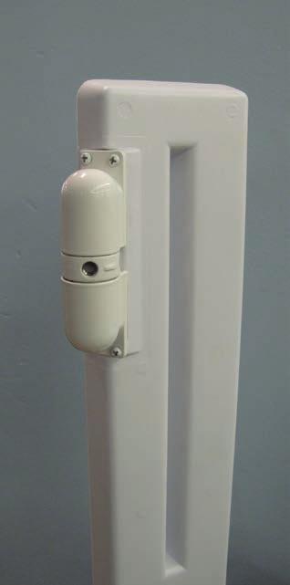 Mount the closer onto the hinged post on the flat area of the post above the 2 hinges.