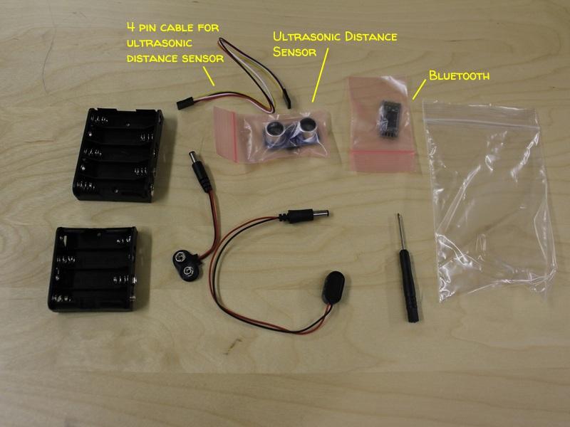 Step 2 In the Miscellaneous Bag, there should be: 1 4xAA battery holder, 1 5xAA battery holder 1 ultrasonic distance sensor (robot s eyes) 1 4pin cable for the ultrasonic distance sensor 1 Bluetooth