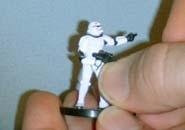 Moderate Repositioning Techniques By Jack Irons Welcome to the fifth in a series of articles about customizing Star Wars Miniatures. Last time, we used the hot water method to make simple repositions.