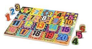 A full-color, matching number appears under each piece, and counting pictures equal to each numbered piece are shown on the puzzle board.