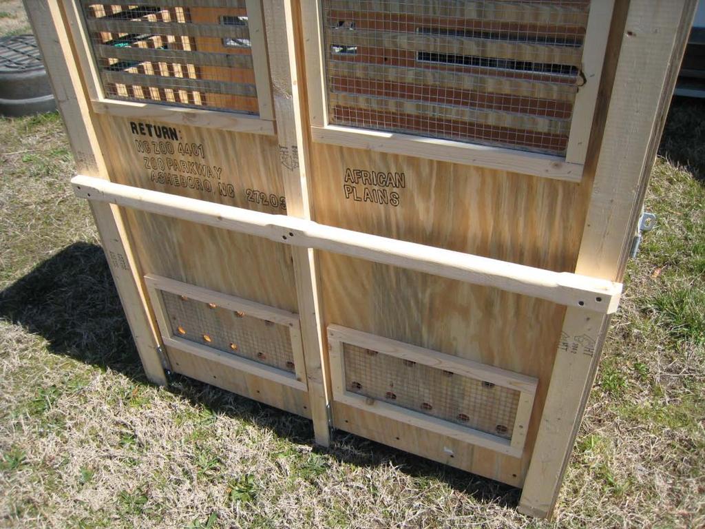 Crate handles are positioned so that keepers can more easily pick them up and carry them.