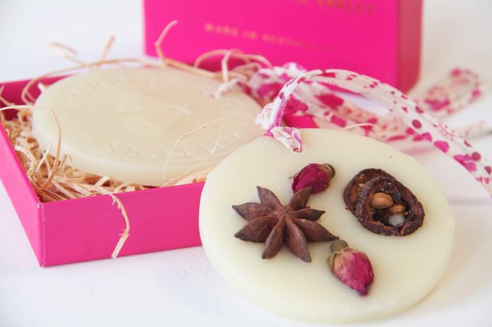 Scented Beeswax Tablets Studded with dried roses, star anise and hawthorn to keep your clothes smelling