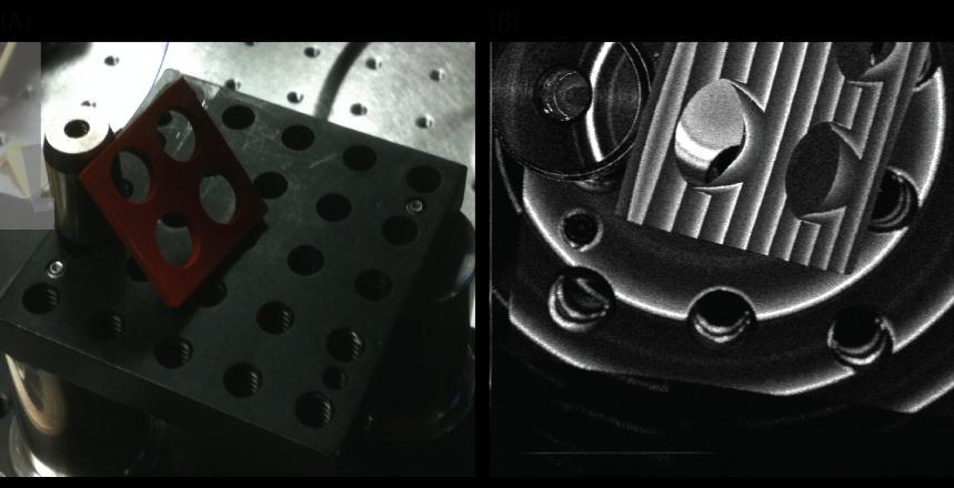 surface reflections of the rubber phantom, the resting metal post, and the small optical breadboard (Fig. 15B).