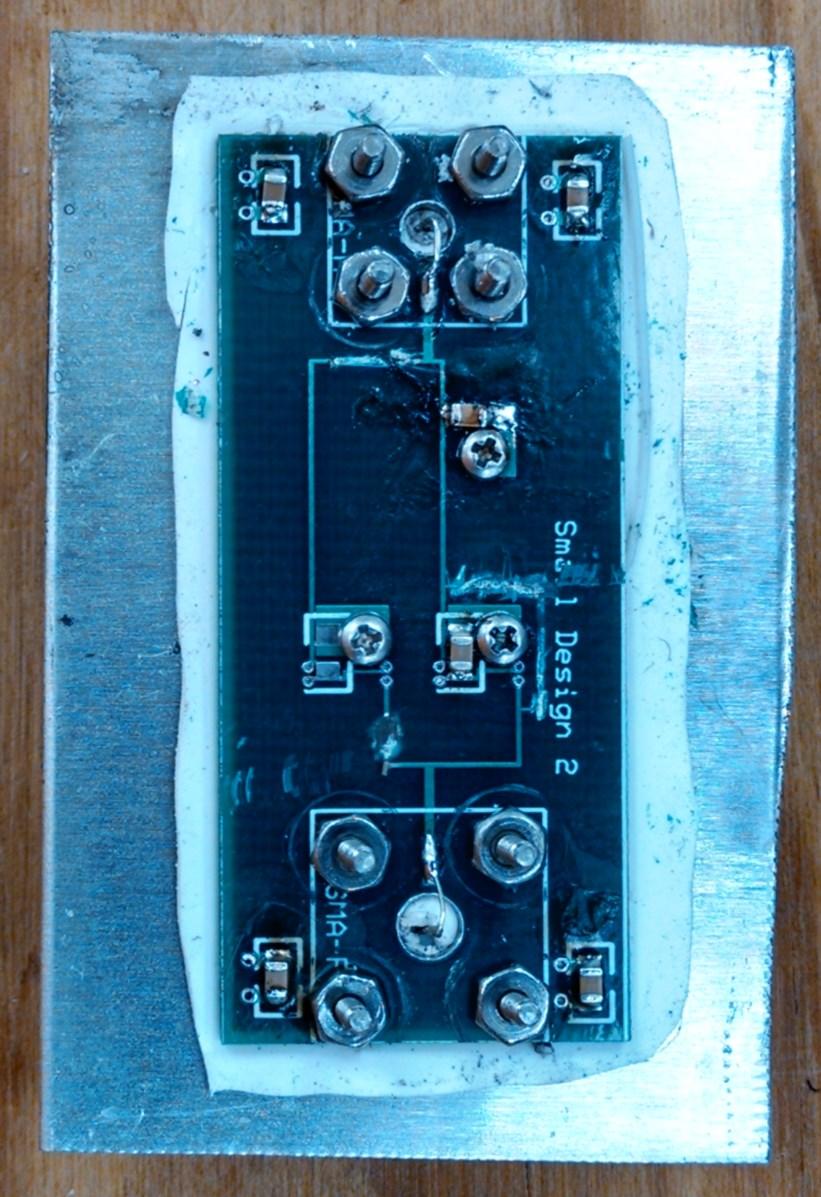 Fig. 3. Top view of constructed board with both filter capacitors soldered on. 3. Experimental Results Fig. 4. Cross section of constructed board.