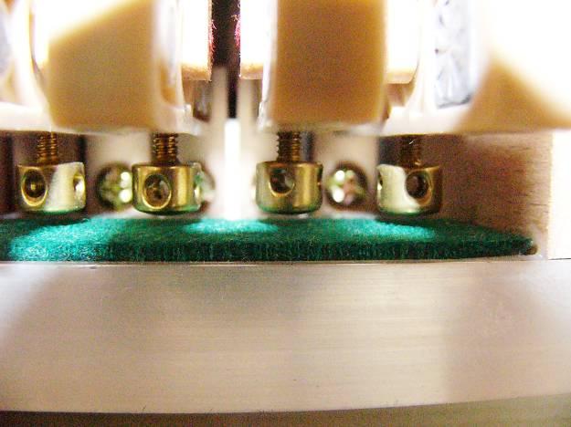 1 to 2 mm), which is adjusted using the head of the pedal rod.