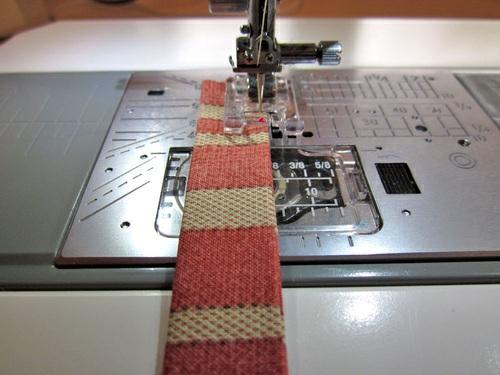 6. Repeat to create the loop strip. 7. Place the wallet lining side up and flat on your work surface. 8.