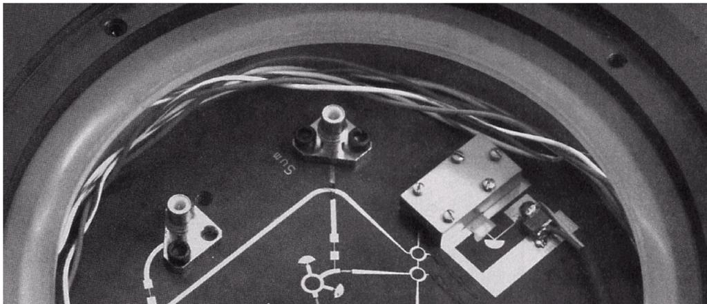Figure 12-36 (p. 626) Photograph of a 35 GHz microstrip monopulse radar receiver circuit.