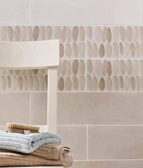 The three plain tiles in subtle shades have a soft weathered look and are complemented