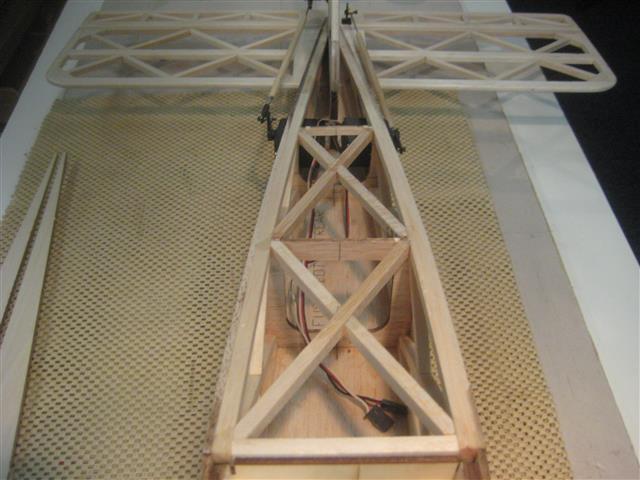 *Cut, fit and glue in place 1/4 x1/4 balsa sticks to form the top truss construction