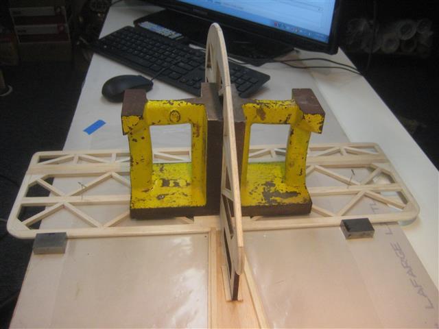 *Fit and position the vertical fin on the center line of the horizontal stabilizer with the offset in the vert.