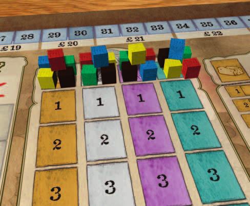 A player places the four price indicators next to the price scales.