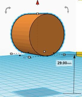 Step 4: Using the cone located at the top of the cylinder, raise the cylinder up 29 mm.
