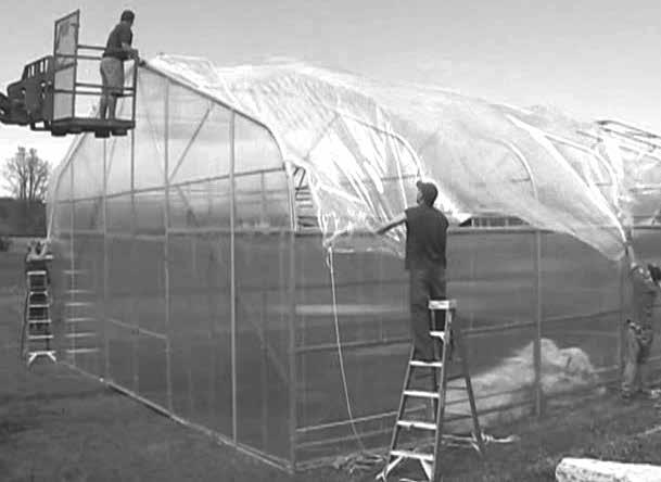 INSTALL MAIN COVER (continued) 3. Throw ropes over top of greenhouse and pull film into place. ASSISTANCE IS REQUIRED.