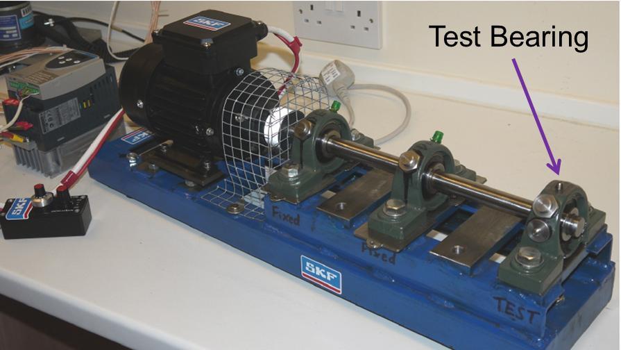 2. EXPERIMENTAL SETUP The bearing test rig has a coupled VSD (variable speed drive) motor driving a shaft supported on three identical bearings (FK UCP203).