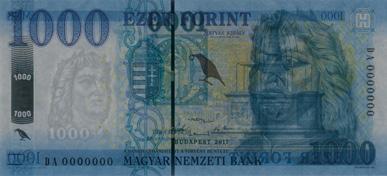 lighter tone than that of the banknote. If you look at the watermark area under UV-A and UV-C light on the front, the image a raven holding a ring in a frame and the number 1000 appears.