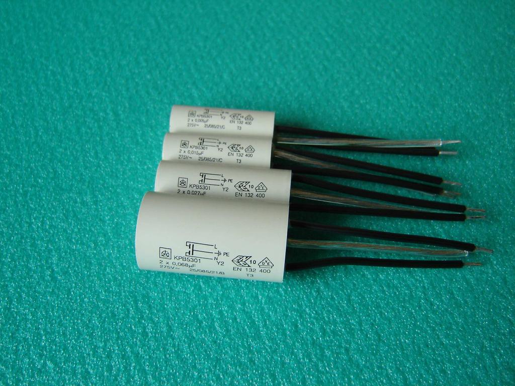 Capacitors: Type KPB 53xx two-pole class Y2 Last two numbers in the type designation (xx = 00 to 49) indicate the type of terminals and connectors.