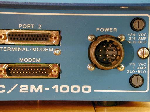 The modem port is used to exchange data over a telephone line with the Aries software.