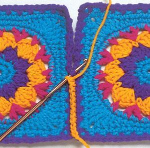 Reverse Single Crochet Joining blocks or strips using reverse single crochet stitches produces a braided cord effect.
