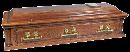 A superior solid Mahogany style hardwood casket with decorative panels to