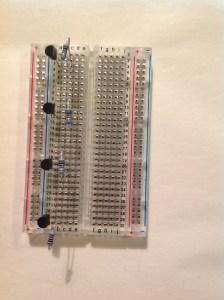 and 3. Second resistor legs into column C rows 11 and 12. Third resistor legs into column C rows 20 and 21.
