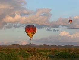 HOT AIR BALLOON FLIGHT The beauty is overwhelming as the cool breeze and calm winds raise you above the ground.