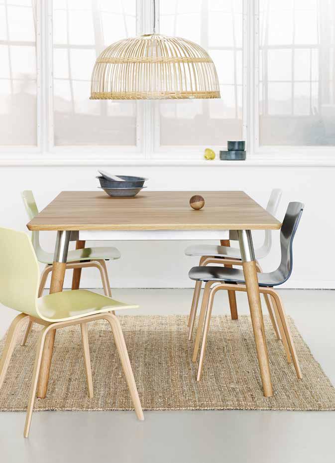 KEEP IT SIMPLE Combine a simple and beautiful wooden table with light chairs in delicate pastels, and keep both