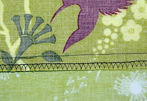 And, to avoid using pins near the blade of the serger, use a long basting stitch on your sewing machine to hold the