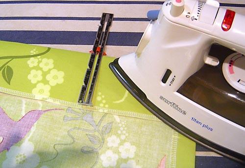 3. If you plan to use a double-fold hem finish, fold the raw edge under ¼" and then